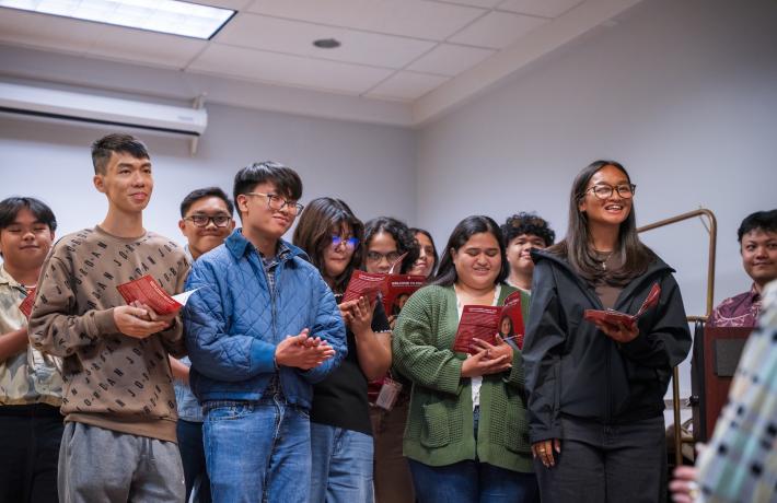 Students from Northern Marianas College sing during welcome event for Lagipoiva Cherelle Jackson