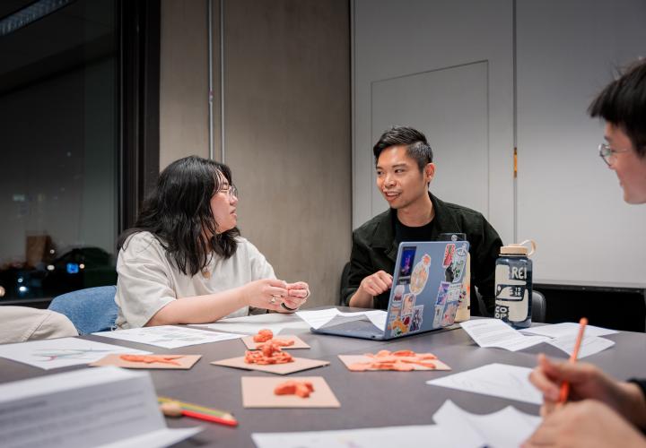 Students and professor making clay art as part of Intro to Asian American Studies class