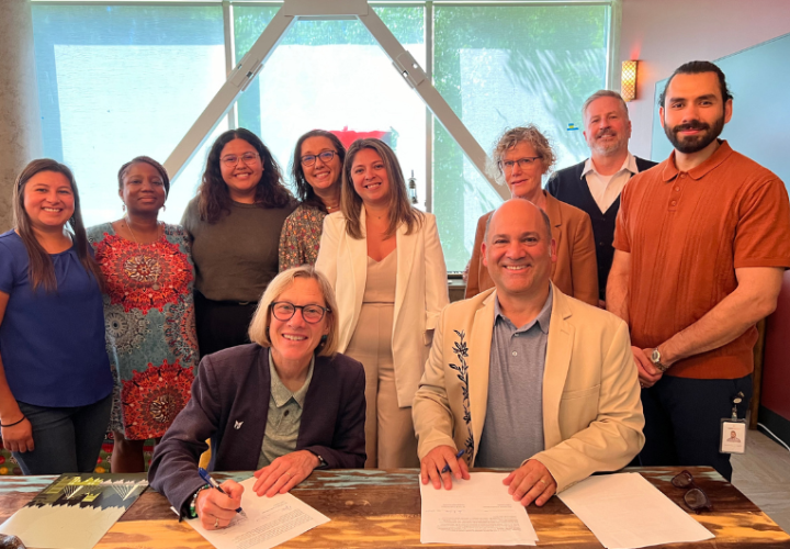 PSU and Latino Network leaders pose at MOU signing