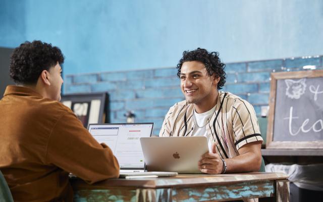 Students on laptop in MENASA