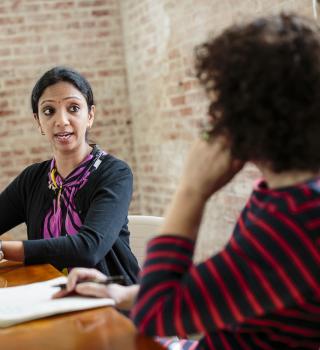 Two people having a meeting