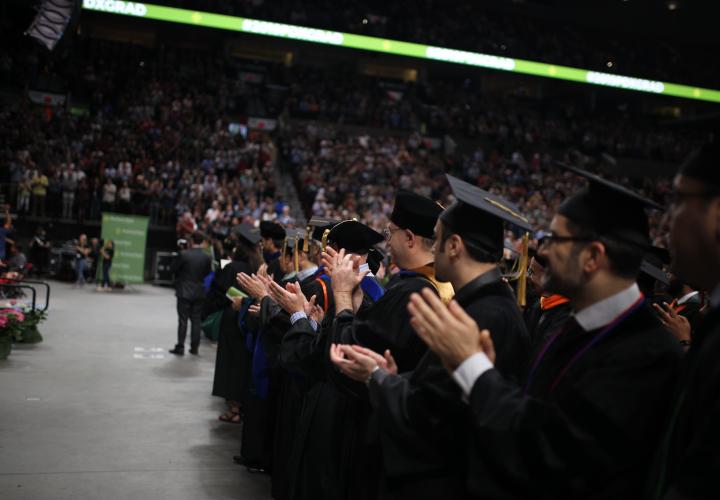 Doctoral graduates and faculty at commencement