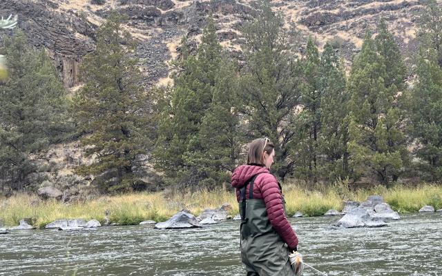 Person wading in lake