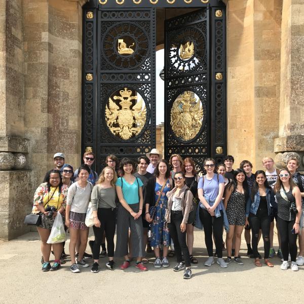 Group of students in front of palace gates in London
