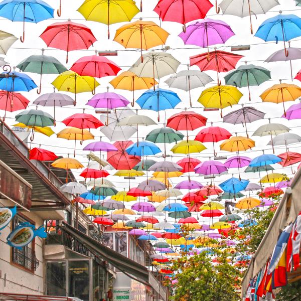Colorful umbrellas over a street