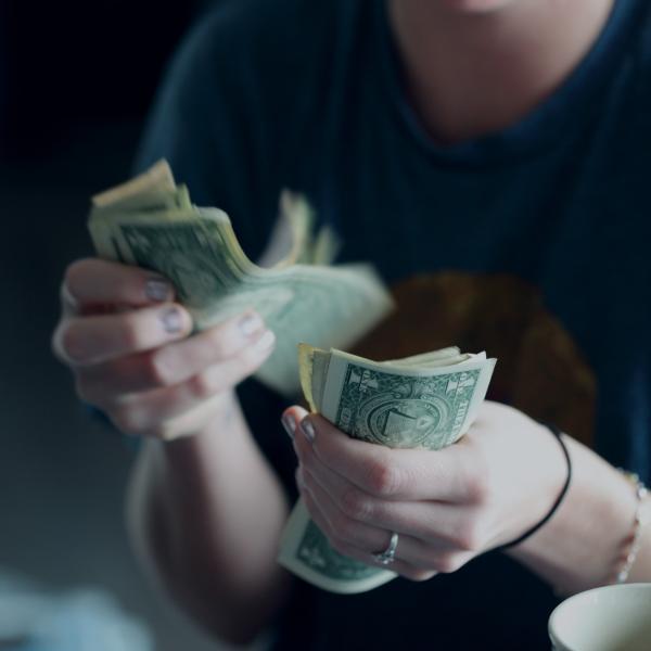 person counting money