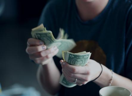 person counting money
