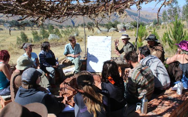 Student group attending lecture outside