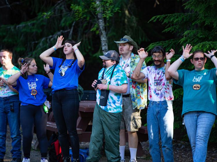 Campers and counselors singing