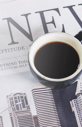 Newspaper and coffee