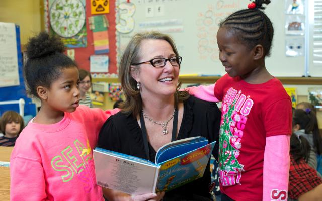 Teacher with children