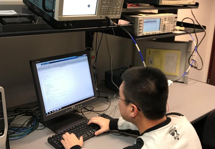 Student in communications lab