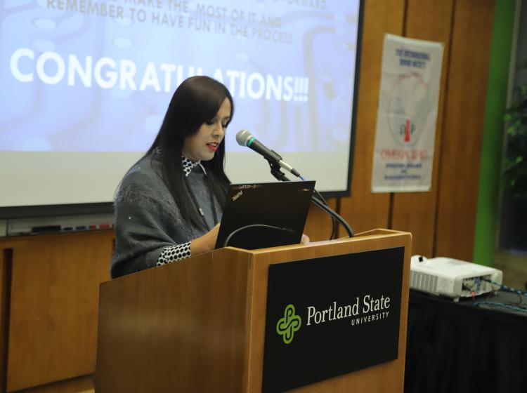 Woman at podium