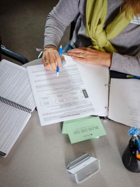 Student filling out paperwork