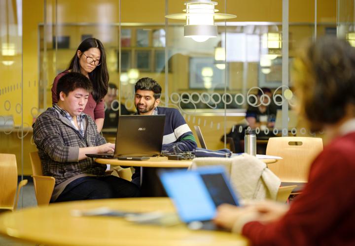 Group of students working on computer