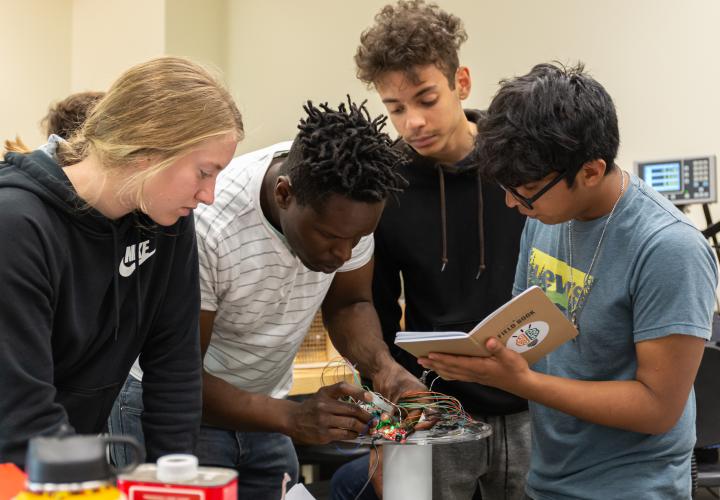 High school students working on engineering project