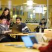 Students looking at laptop