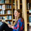 Student sitting and reading in Powell's Books