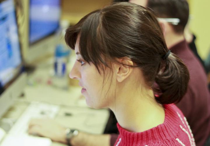 Woman working at computer.