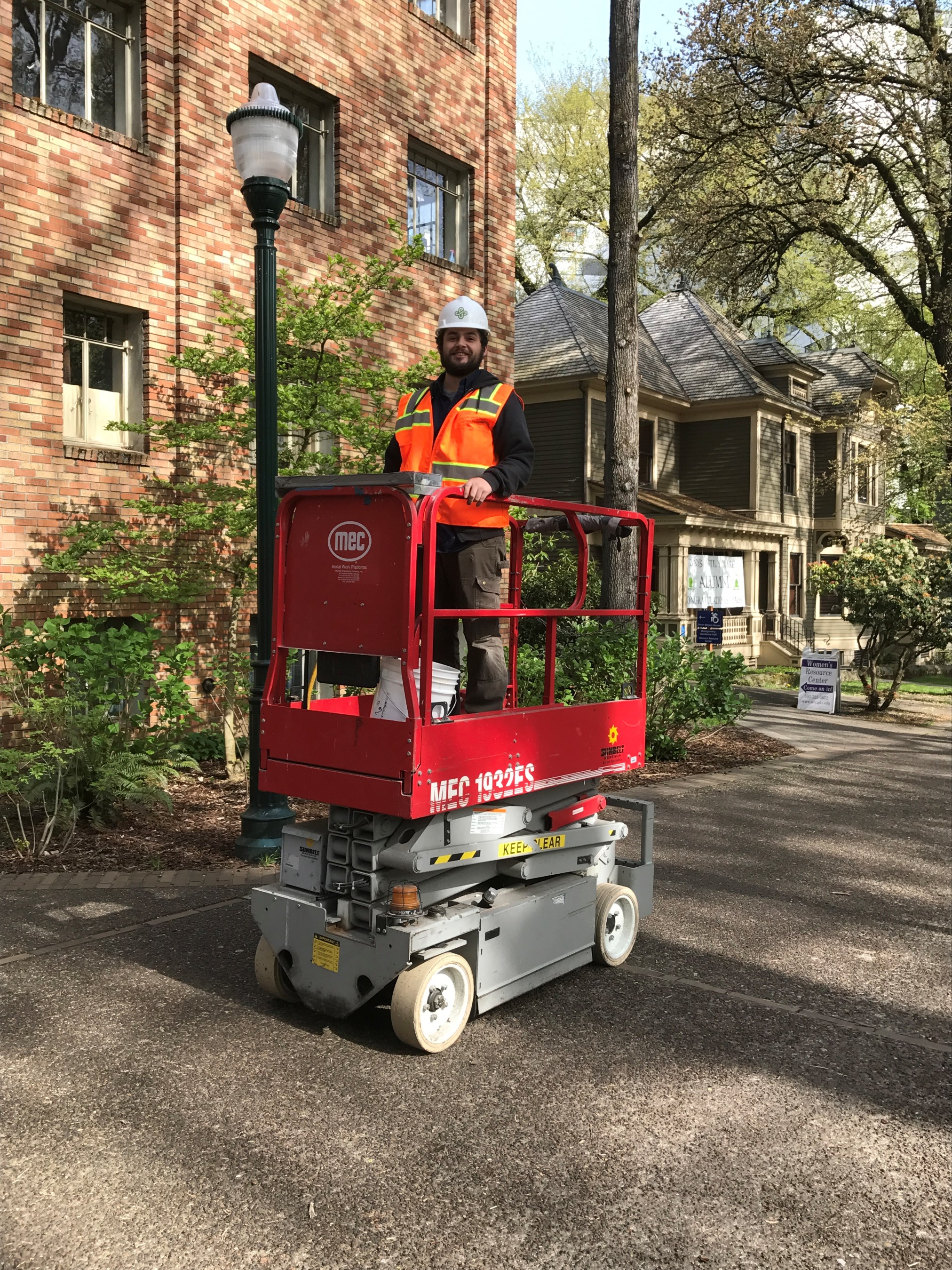 A man on a scissor lift