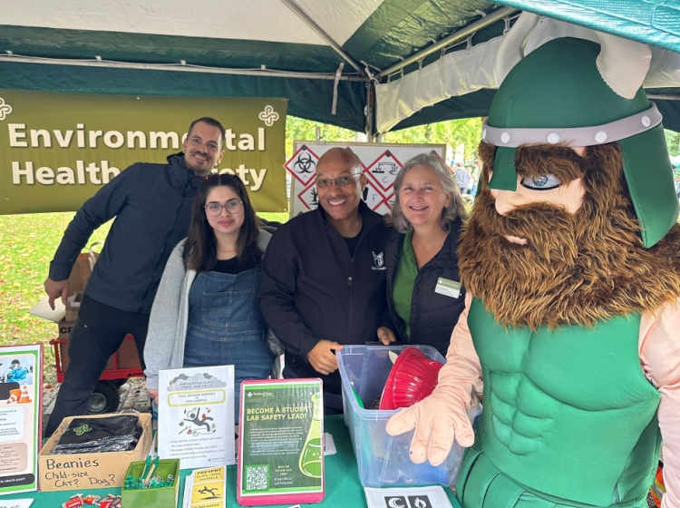 Group of Environmental Health & Safety workers with Victor the Viking