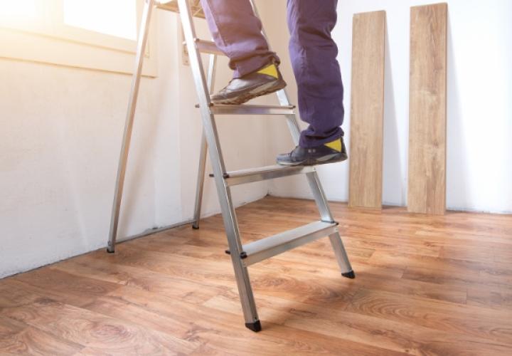 picture of person climbing down ladder