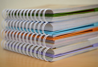 Stack of spiral notebooks