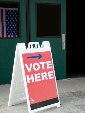 Vote here sign