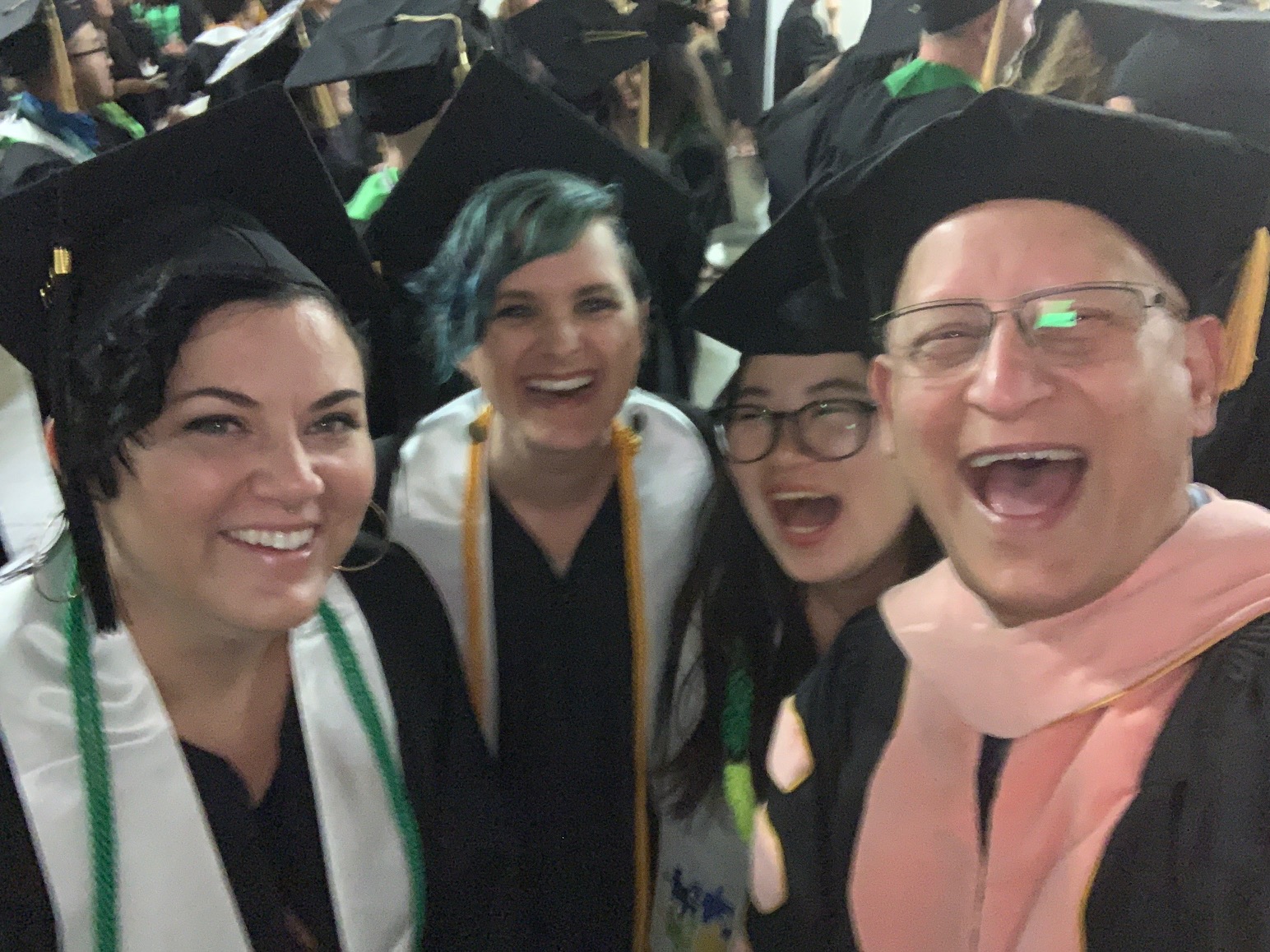 Faculty and students at graduation