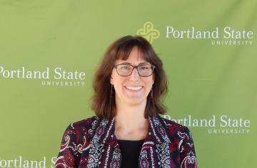 A head shot photo of Lauren Frank.