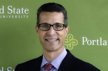 A head shot photo of Jeffrey Robinson. 