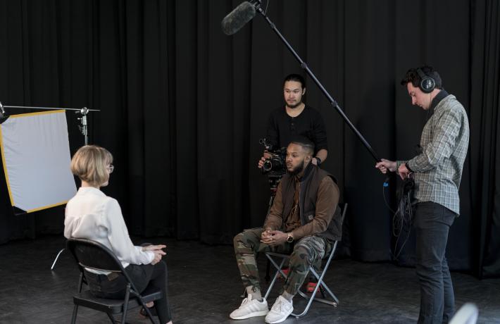 Group filming in studio