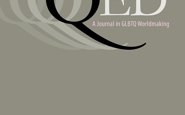 Gray block with text: QED