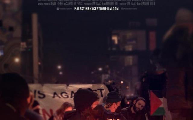 A student protest at night with a banner in the background and candles in front of a line of seated students