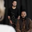 Two students filming in studio