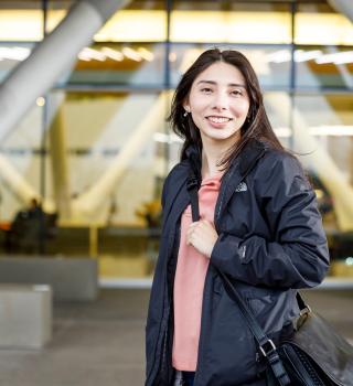 grad student with bag