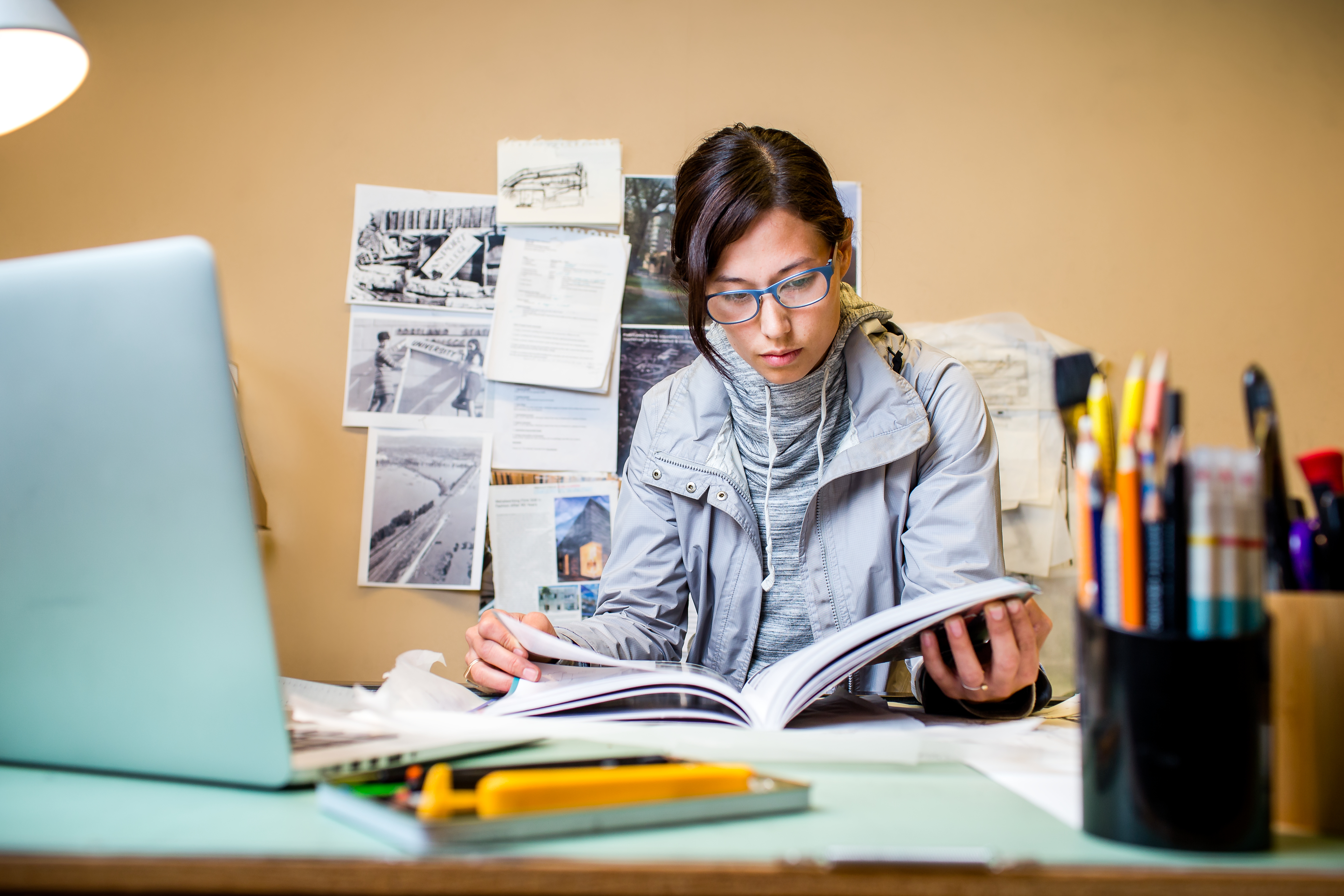 Female student reading a book