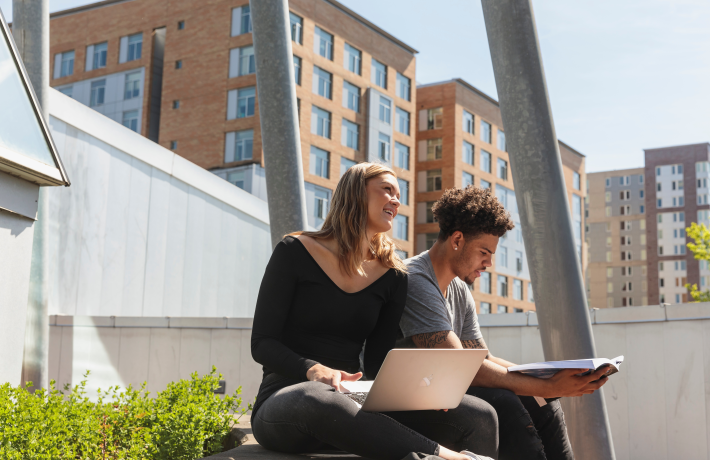 Two students sitting together