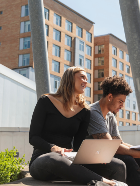 Two students sitting together