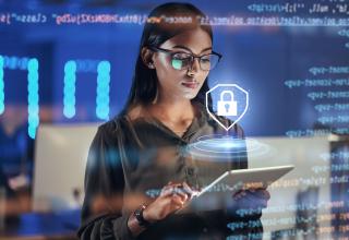 Image of a girl reading about cybersecurity