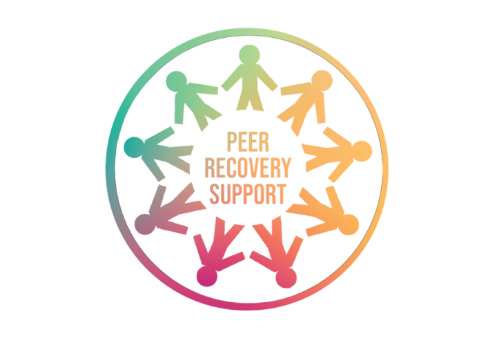 peer recovery support - people in a circle holding hands in support