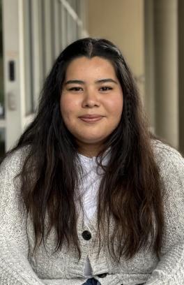 Monique headshot in front of SHAC