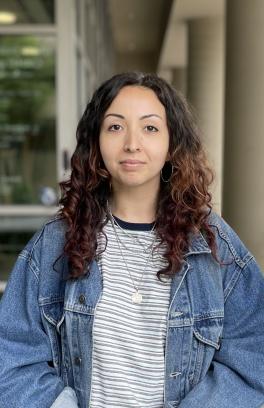 zoe headshot in front of shac