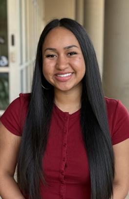 Nina Nicole David headshot in front of SHAC