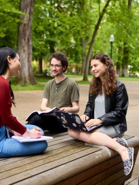 Sophia sitting with other students