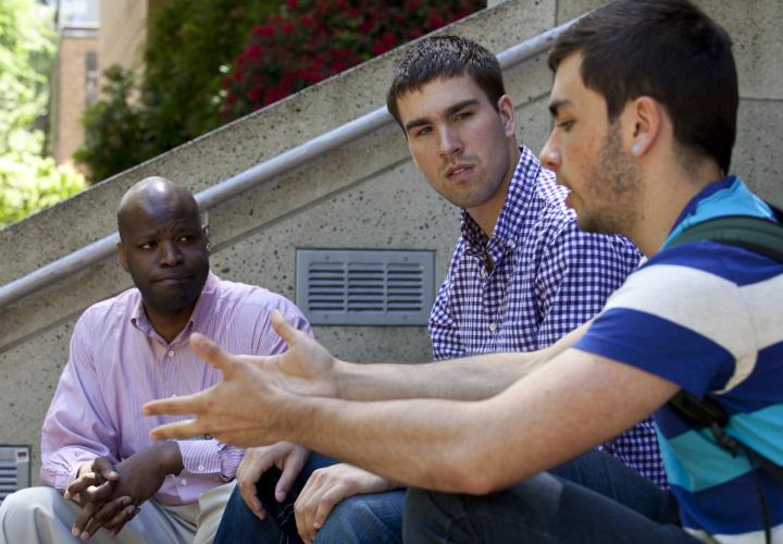 PSU honors students relaxing by the library