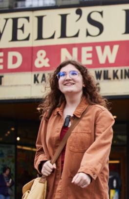 Chayse walking in front of Powells