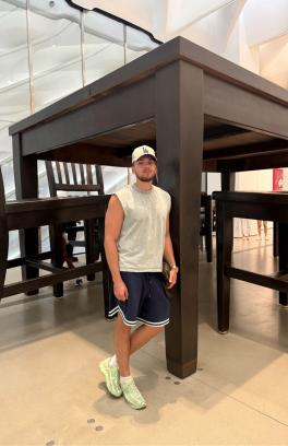 Vlad infront of a huge table
