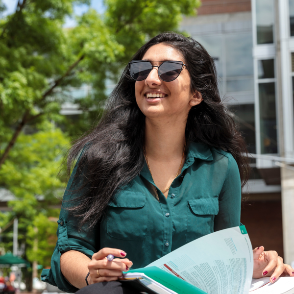 student studying outside