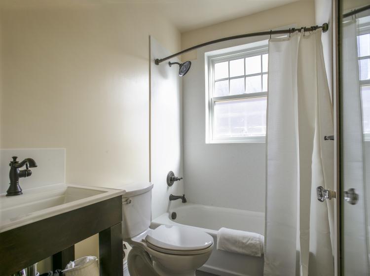 full bathroom with tub and shower